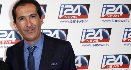 Drahi, Franco-Israeli businessman and founder of Numericable, poses during a roadshow for the Israel-based broadcast news channel i24 News in Paris